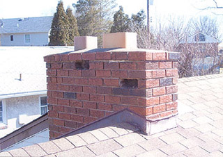 Chimney with deterirated bricks cut out