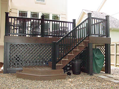 Photo of a Cedar Deck With Staircase and Metal Balusters