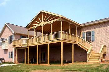 Photo of a Deck With Partial Roof and Staircase