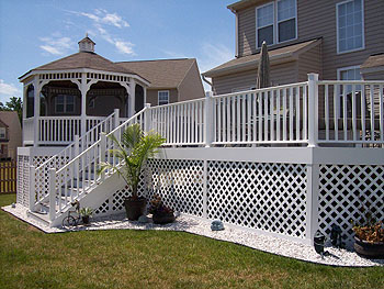 Photo of  a Custom composite Deck with Screened-In Gazebo and composite lattice