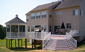 Photo of a Deck With TimberTech planks and 
aluminum powder coated balusters on all the railings