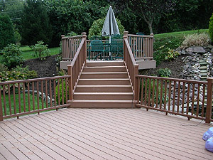 Photo of a Deck With TimberTech planks and 
aluminum powder coated balusters on all the railings