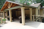 Open air gabled porch with wrapped columns