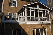 Gabled porch with transoms and white Deckorator rail