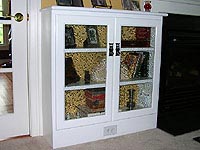 Painted built-in side case with antique German glass