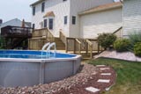 Large treated pool deck for an above ground pool 