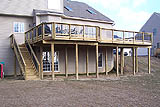 2nd Story Pressure Treated Deck with straight staircase and Metal Balusters